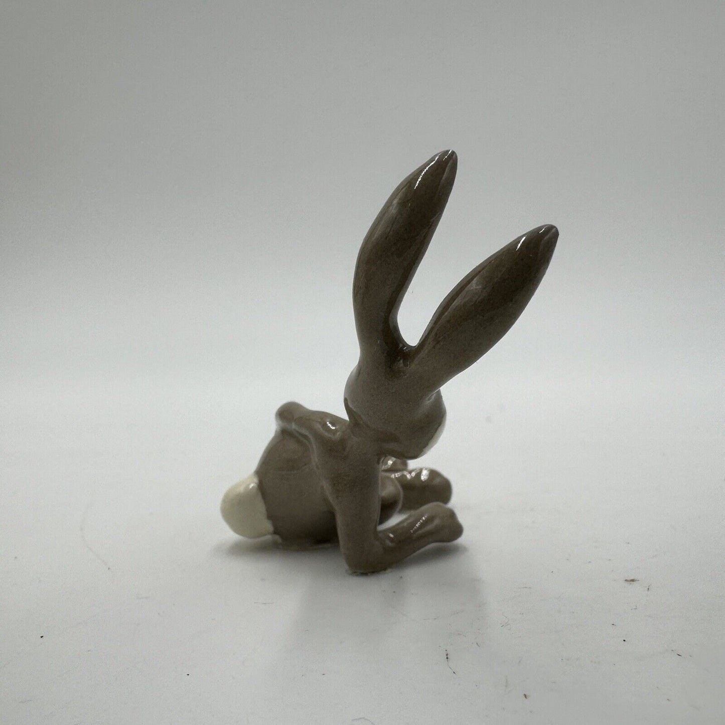 Retired Hagen Renaker Miniature Ceramic Painted Leaning Rabbit Figurine